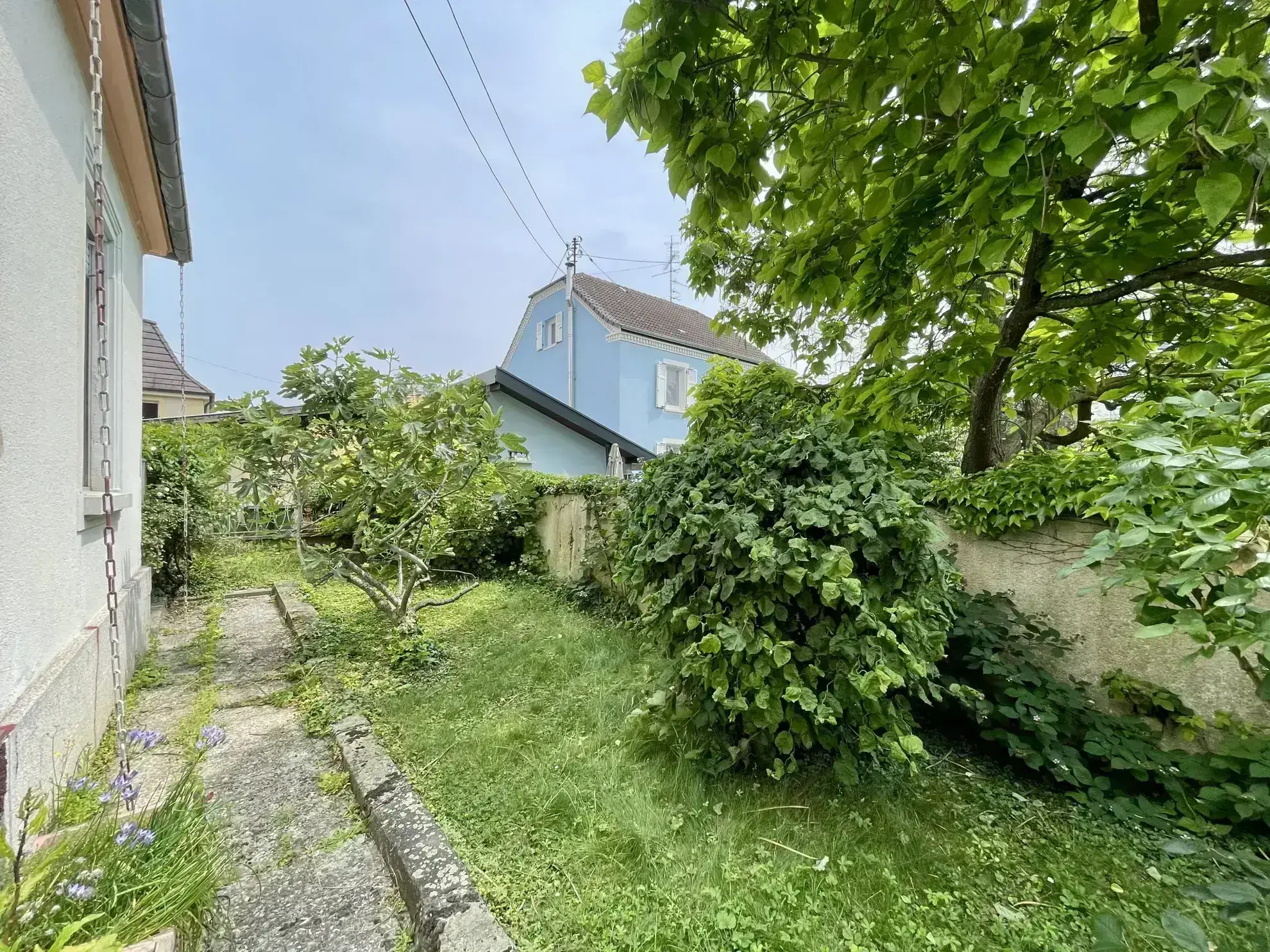 Appartement F5 avec jardin privatif à Kingersheim - Grande superficie et charme authentique 