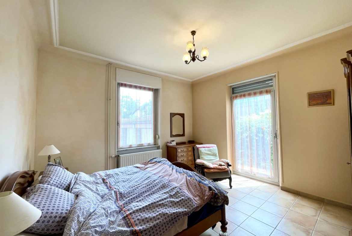Appartement F5 avec jardin privatif à Kingersheim - Grande superficie et charme authentique 