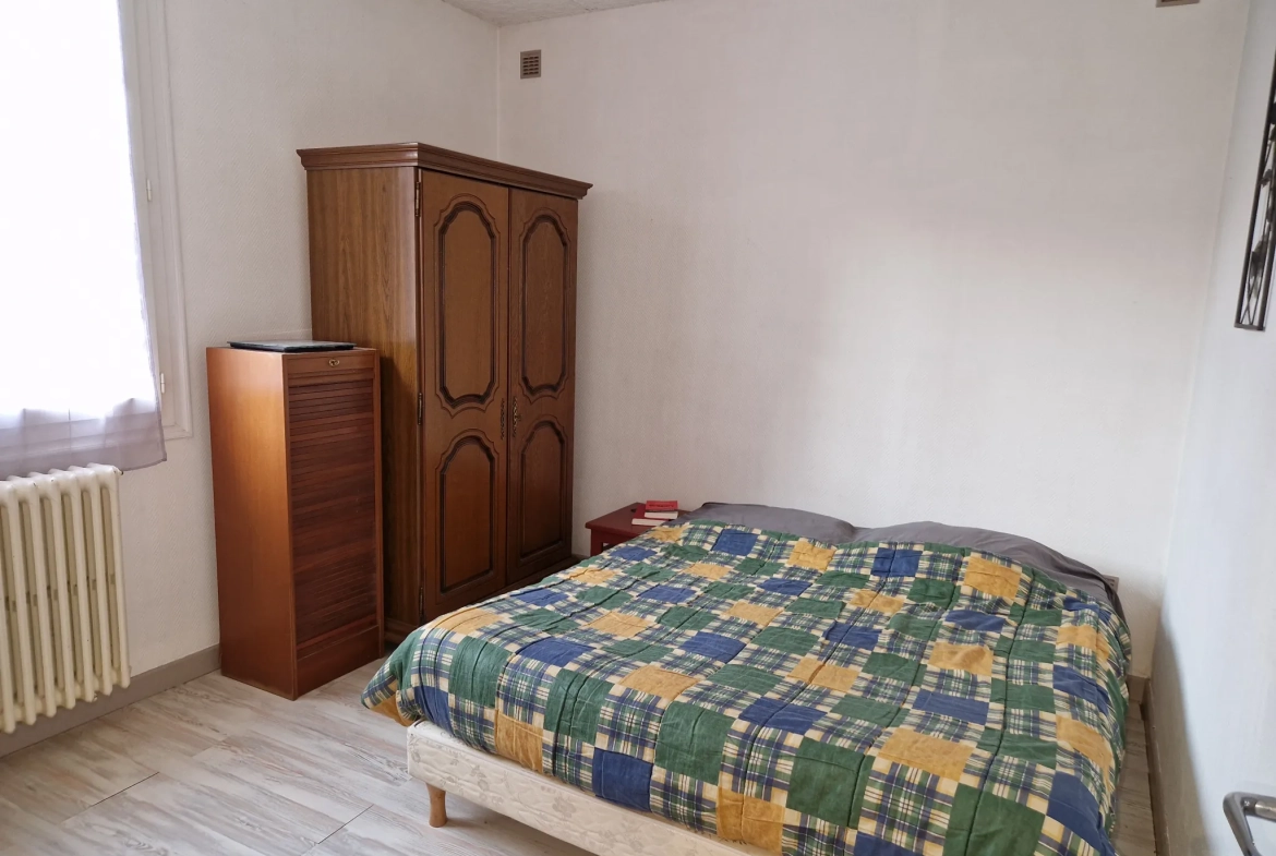 Appartement traversant à Autun avec 2 chambres, cave et chauffage collectif 
