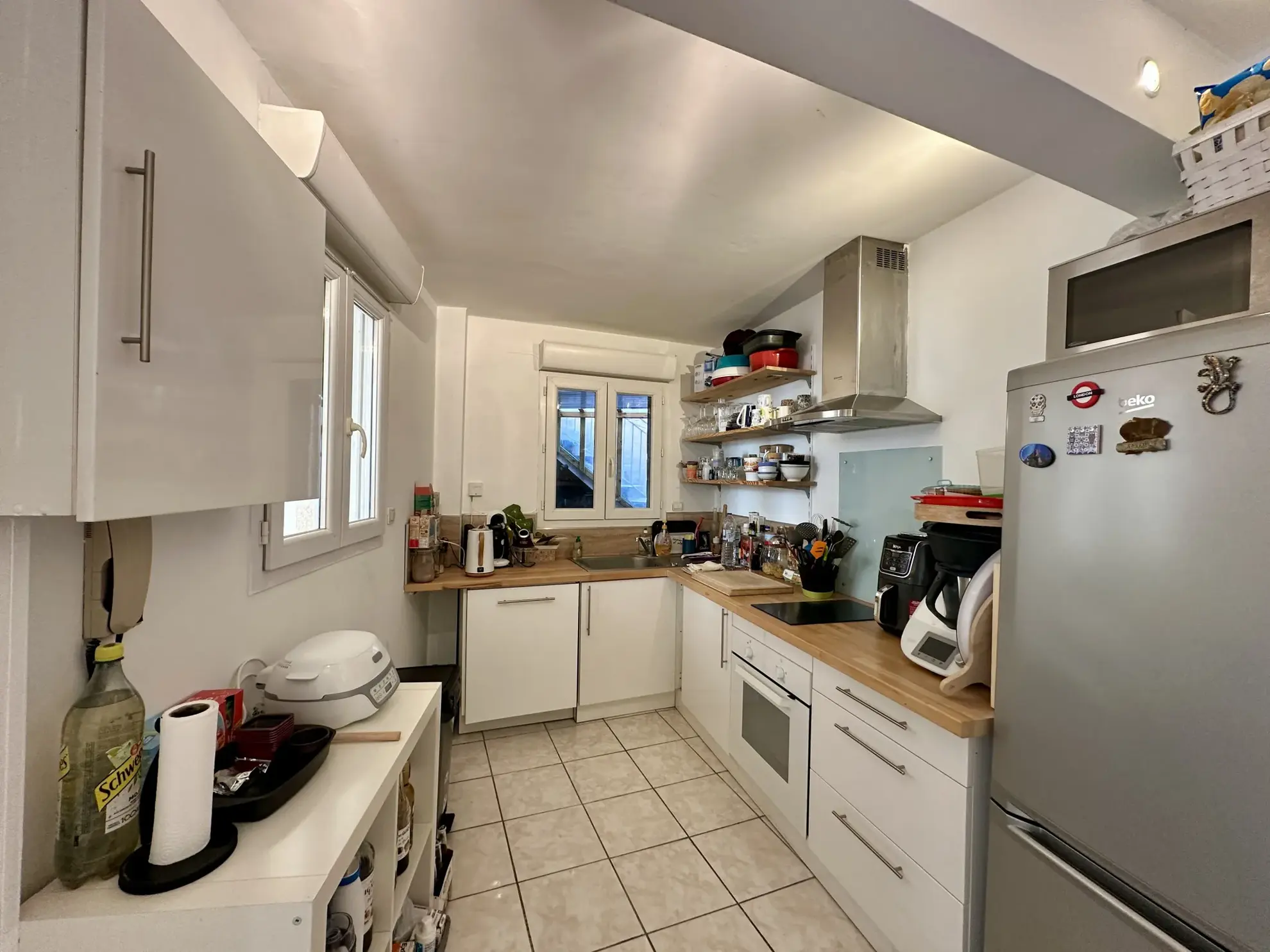Appartement T2 de 55 m² à Lunel avec garage, terrasse et équipements modernes 