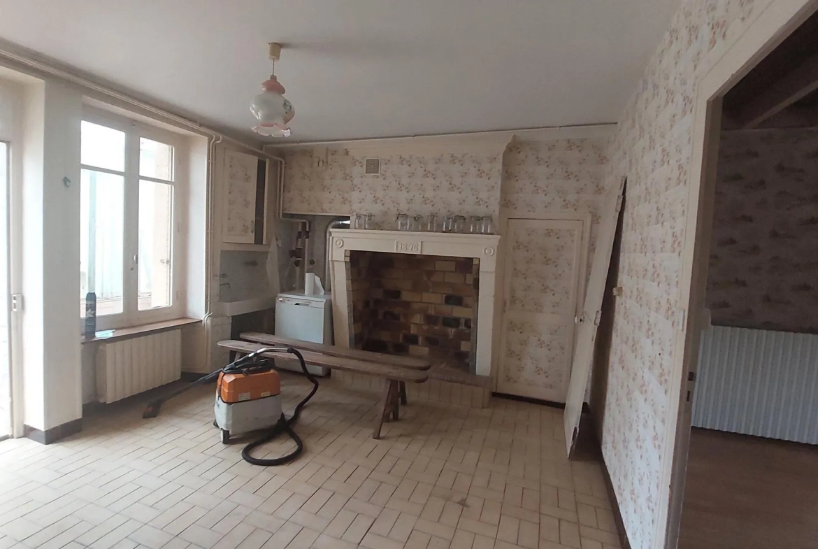 Maison ancienne à rénover avec jardin à Sciecq 79000 