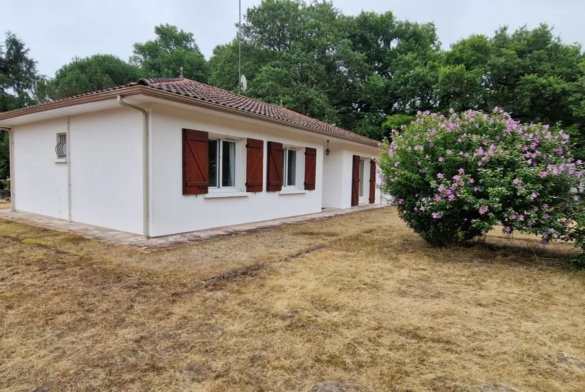 Maison de plain-pied avec garage et jardin à Bernos-Beaulac 