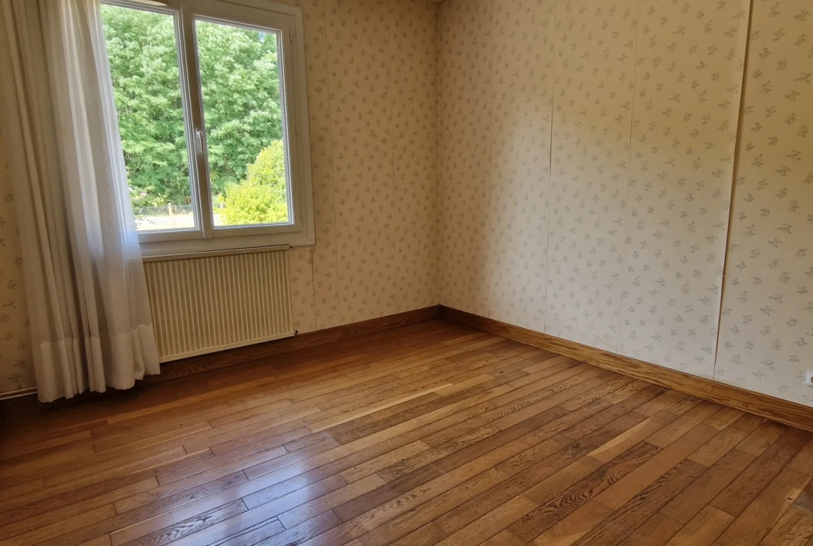 Maison de plain-pied avec garage et jardin à Bernos-Beaulac 