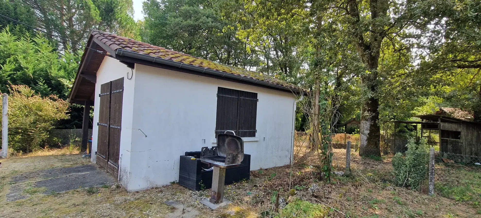 Maison de plain-pied avec garage et jardin à Bernos-Beaulac 