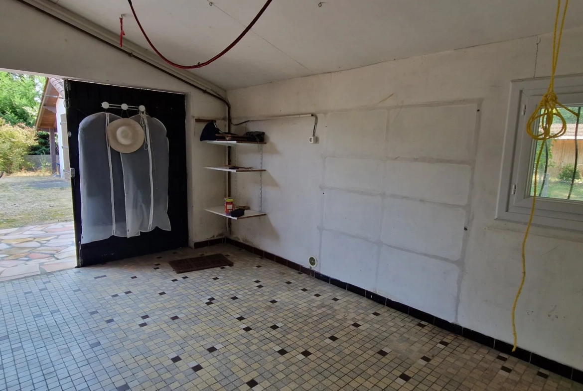 Maison de plain-pied avec garage et jardin à Bernos-Beaulac 
