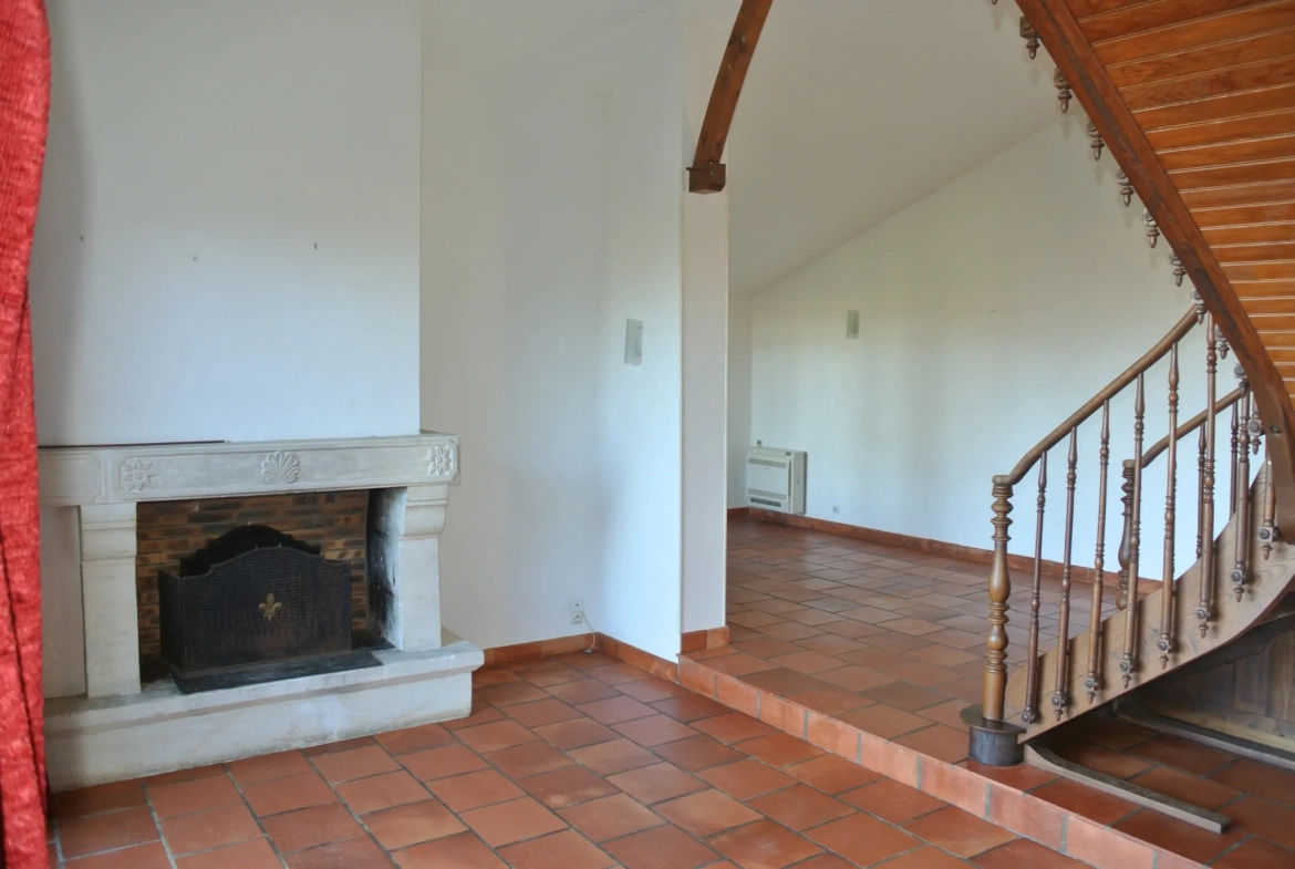 Maison traditionnelle avec garage et grand parc à Fourques sur Garonne 