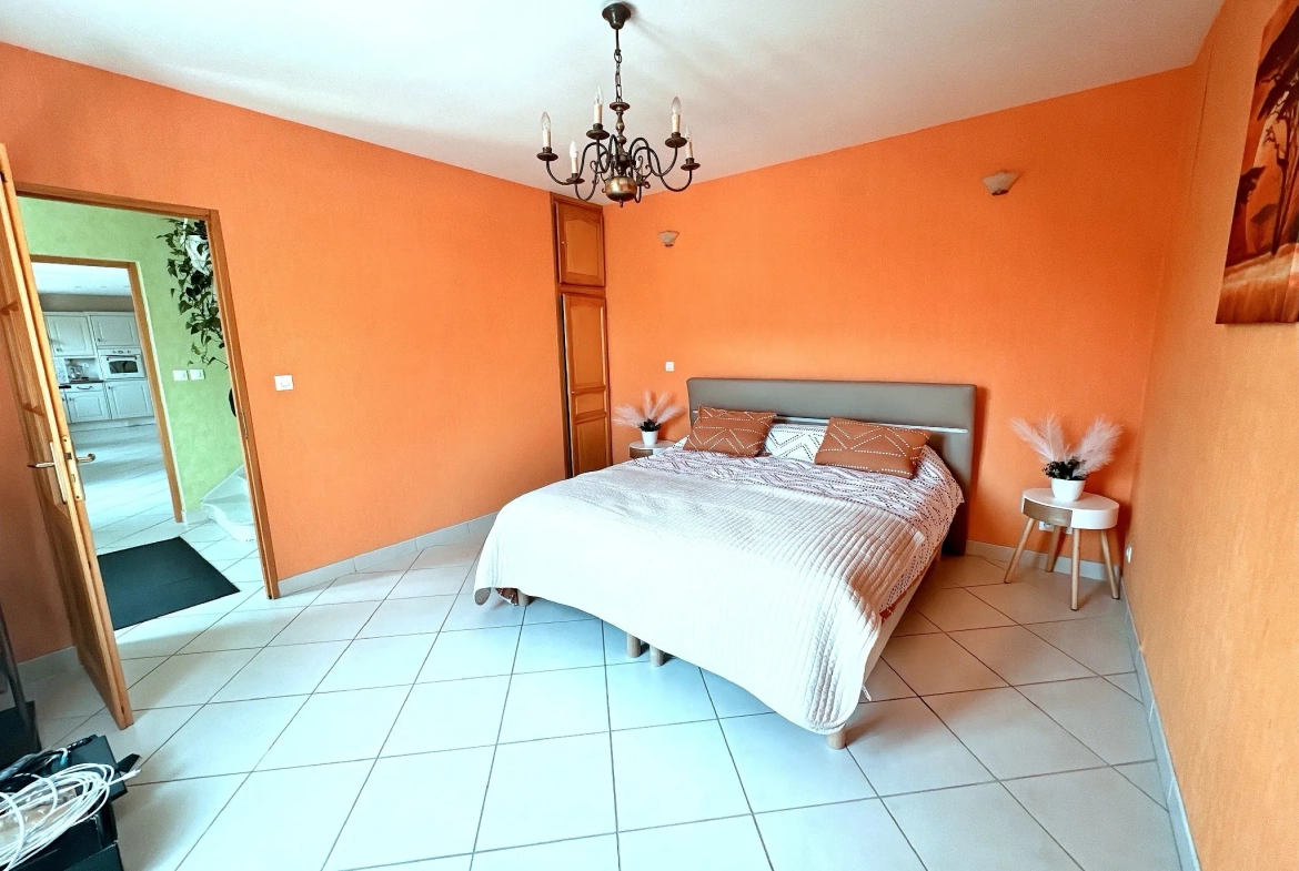 Belle maison familiale de 144 m² avec 4 chambres et jardin constructible à Cantin 