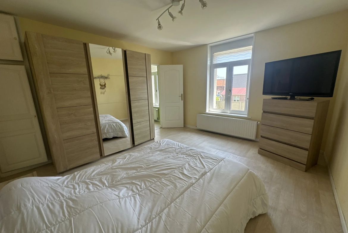 Belle maison familiale de 144 m² avec 4 chambres et jardin constructible à Cantin 