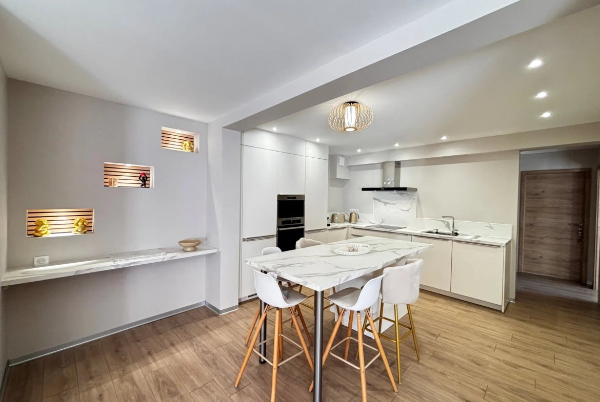 Appartement rénové de 92 m² avec terrasse et parking privé à Montbéliard 