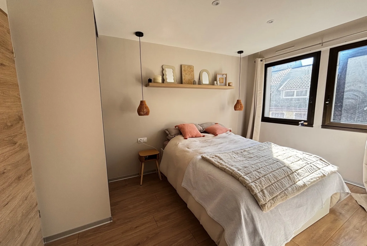 Appartement rénové de 92 m² avec terrasse et parking privé à Montbéliard 