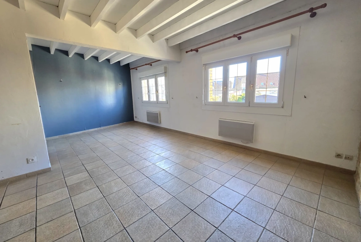Maison de ville à Outreau avec garage, 3 chambres, proche centre-ville - Prix 149 900 euros 