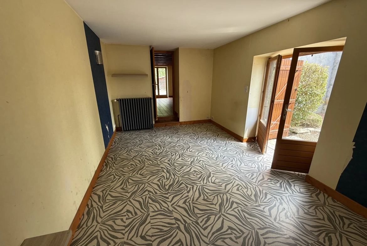 Charmante maison familiale de 185 m² à Saint-Priest-Bramefant avec grand terrain 