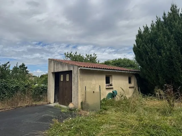 Maison de plain-pied de 124 m² avec jardin et garage à Thire 