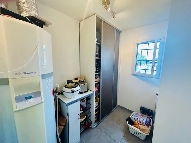 Maison à vendre à Saint Lezer : 120 m² avec 4 chambres, garage et terrain arboré 
