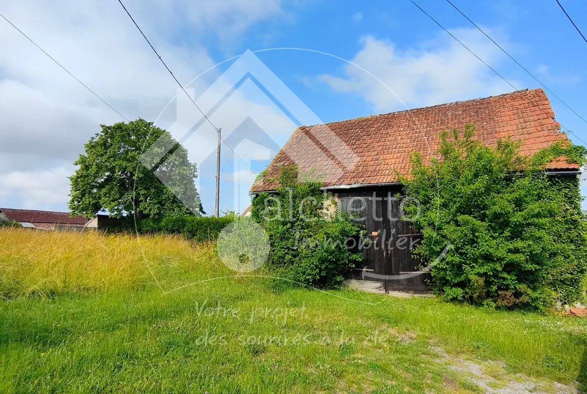 Grange à vendre avec terrain constructible à Saint Gérand-le-Puy 
