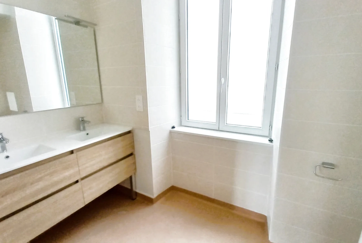 Appartement F3 rénové avec caves à Millau, secteur gare 