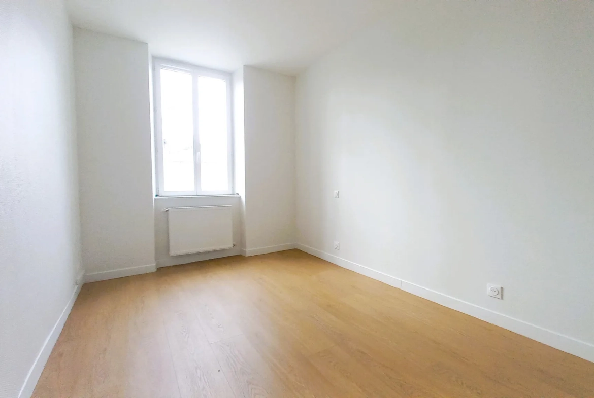 Appartement F3 rénové avec caves à Millau, secteur gare 