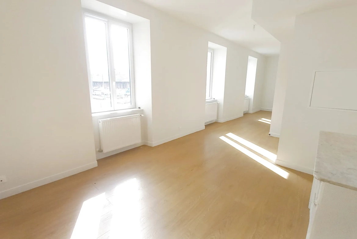 Appartement F3 rénové avec caves à Millau, secteur gare 