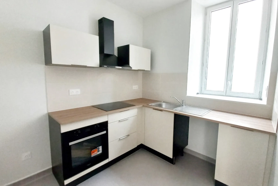 Appartement F3 rénové avec caves à Millau, secteur gare 
