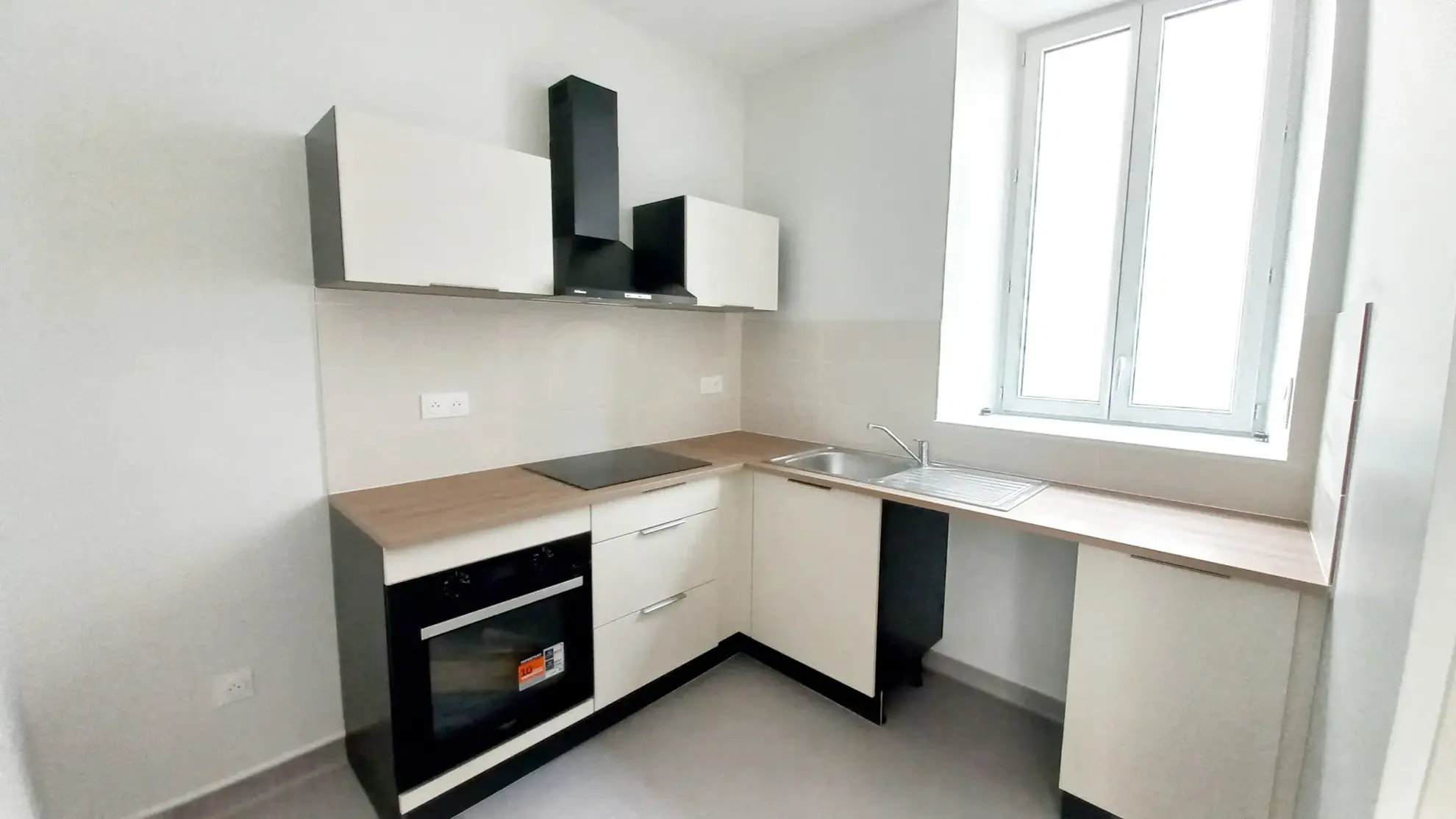 Appartement F3 rénové avec caves à Millau, secteur gare 