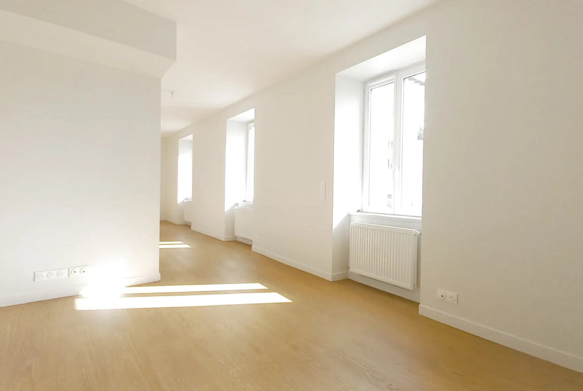 Appartement F3 rénové avec caves à Millau, secteur gare 