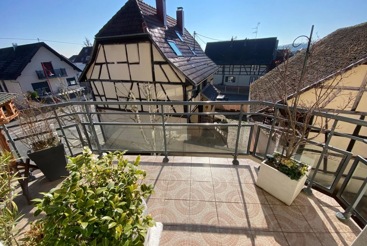 Appartement lumineux de 114 m² avec terrasse, garage et caves à Bartenheim 