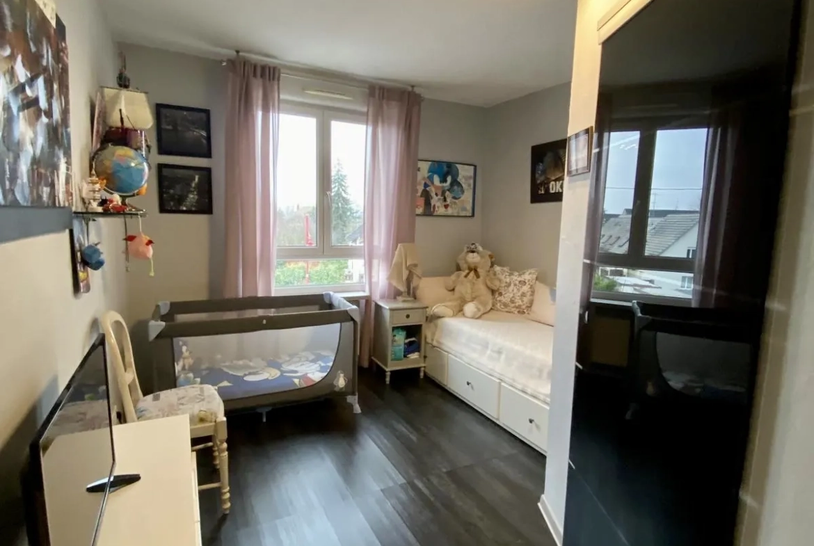 Appartement lumineux de 114 m² avec terrasse, garage et caves à Bartenheim 