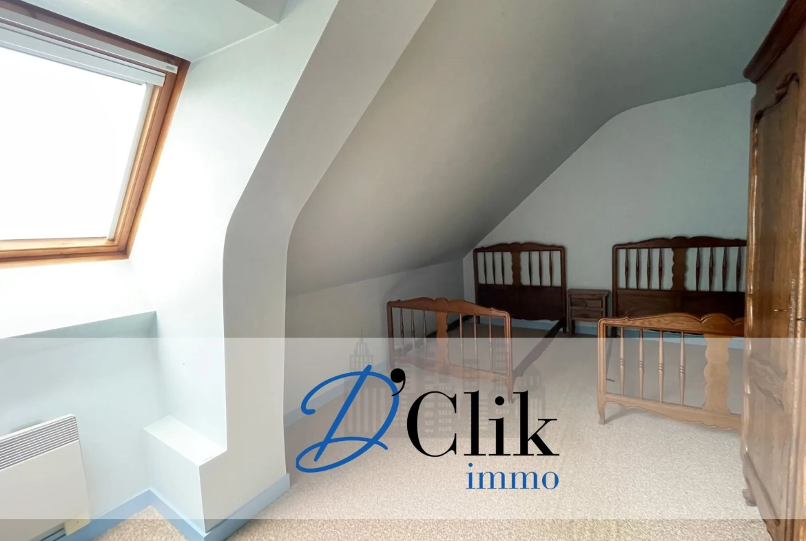 Maison d'architecte à vendre à Changé – 4 chambres, jardin clos, terrasse, calme 