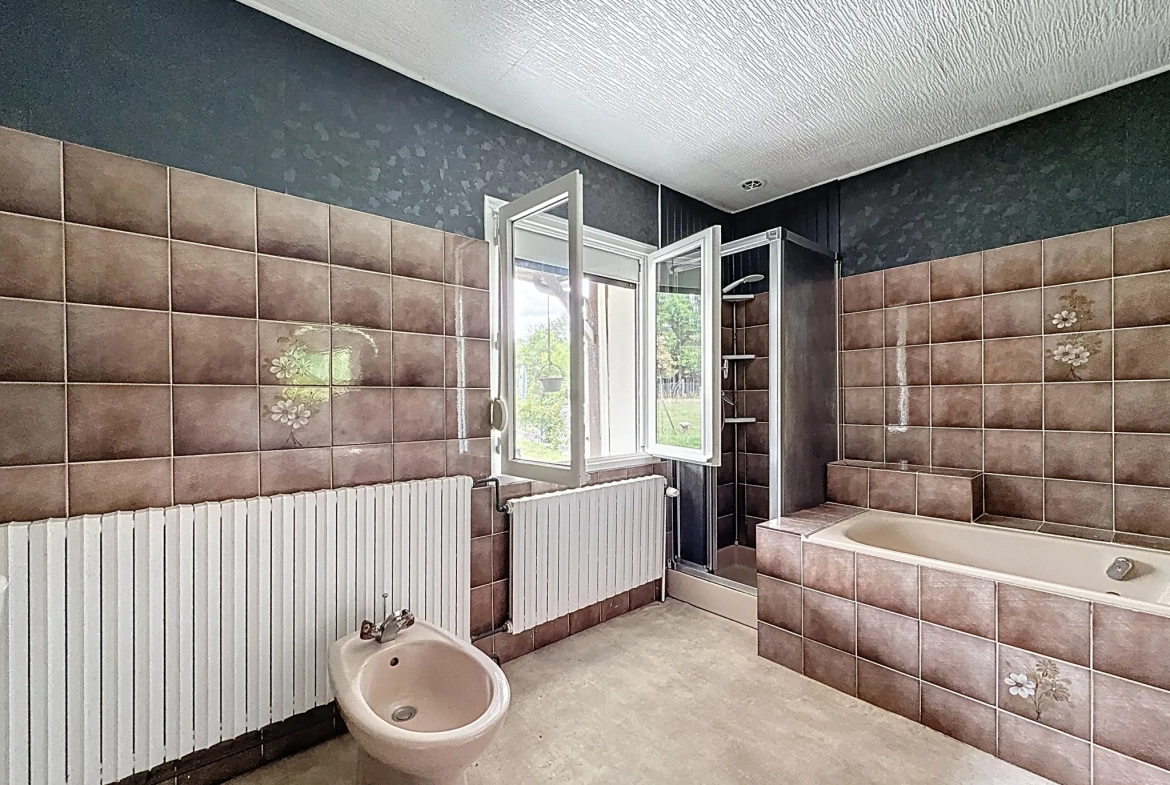 Maison individuelle à vendre à Remoncourt près de Mirecourt et Vittel avec terrain arboré 