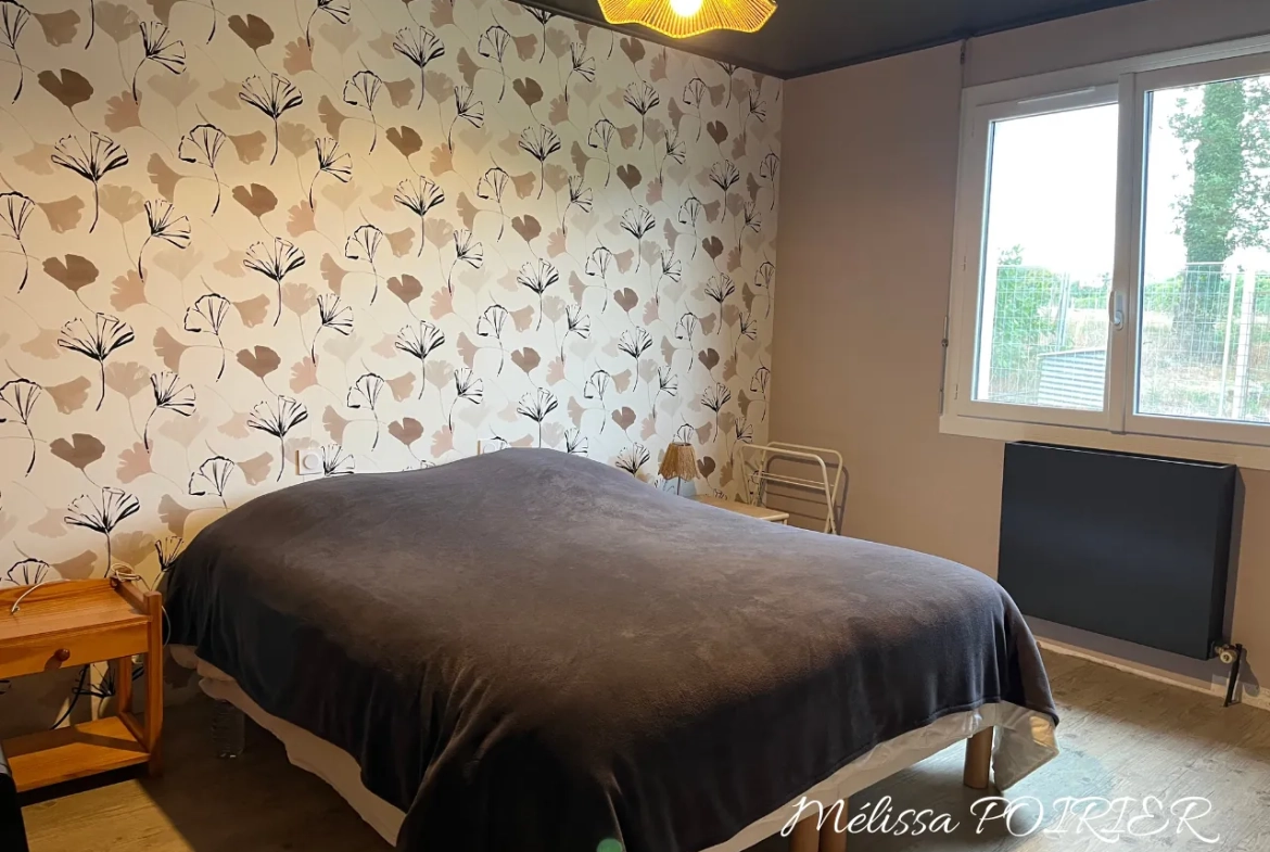Maison de plain-pied avec 3 chambres et jardin arboré à Mortagne-sur-Sèvre 