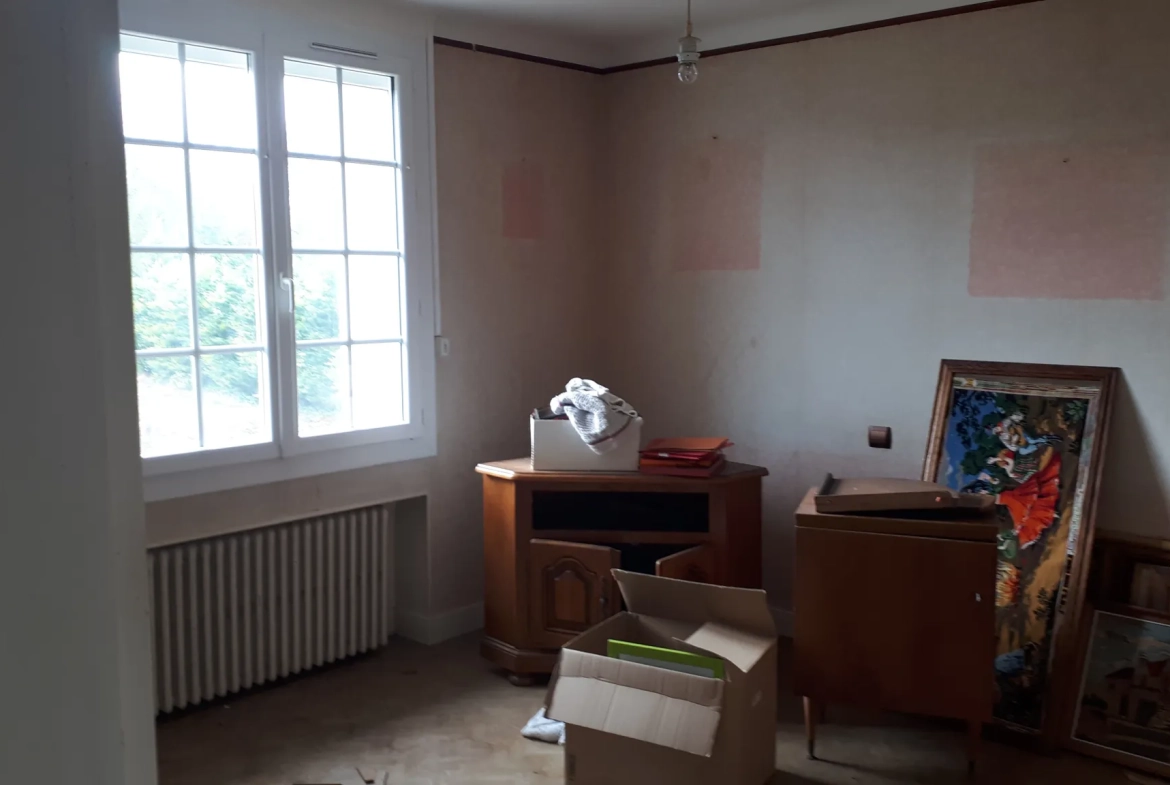 Charmante maison de 90m² avec terrain constructible à Coussay-les-Bois - Isolation et confort optimisés 