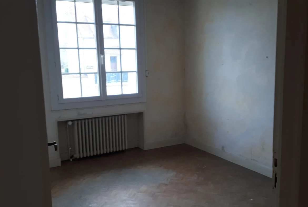 Charmante maison de 90m² avec terrain constructible à Coussay-les-Bois - Isolation et confort optimisés 