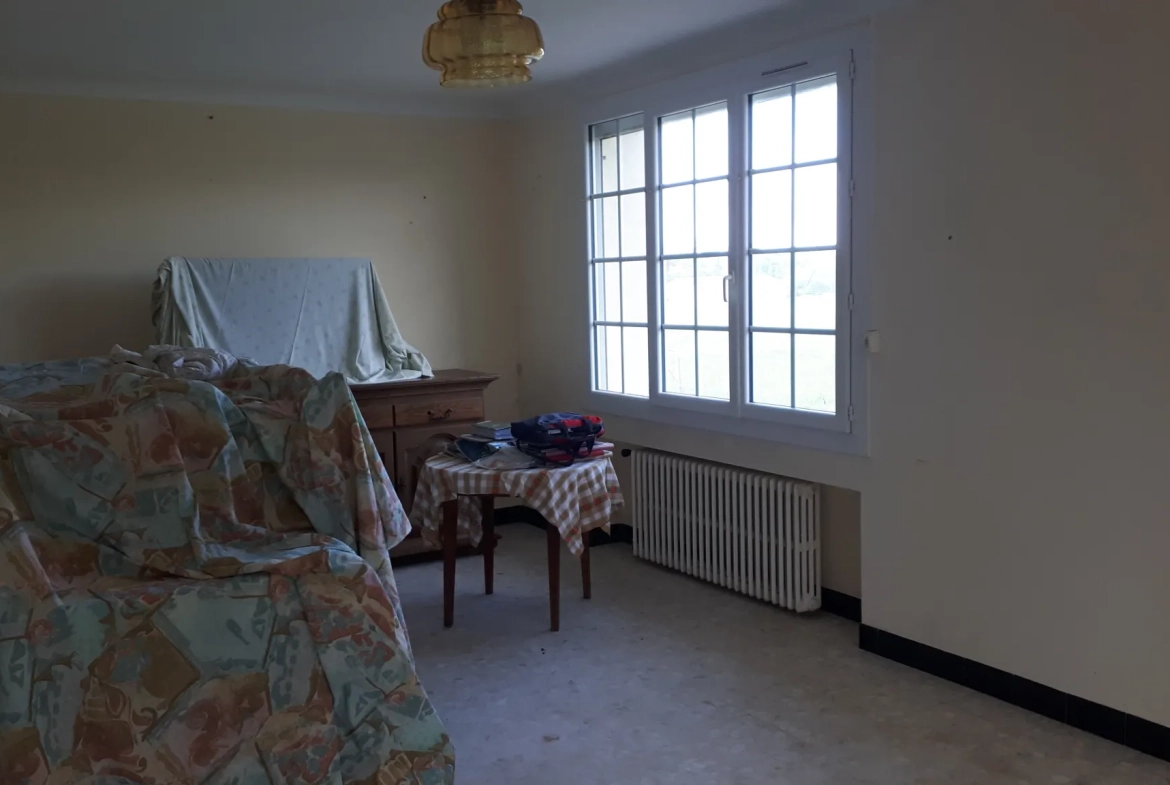 Charmante maison de 90m² avec terrain constructible à Coussay-les-Bois - Isolation et confort optimisés 