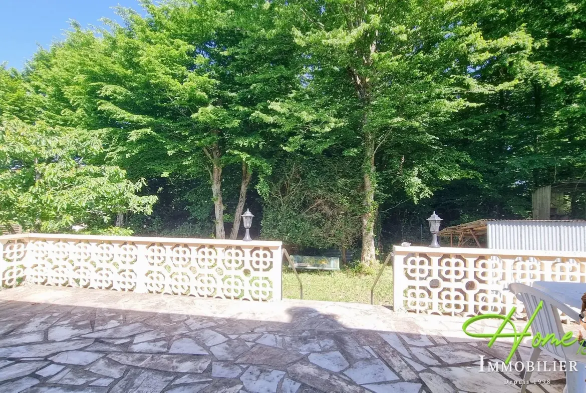 Maison à vendre à Fussy, proche Bourges, 3 chambres, terrasse, sous-sol complet 
