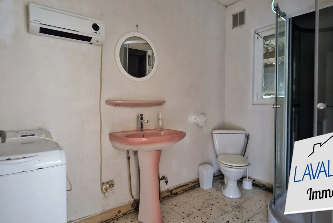 Maison de plain-pied à rénover avec 2 chambres et jardin à Canaples 