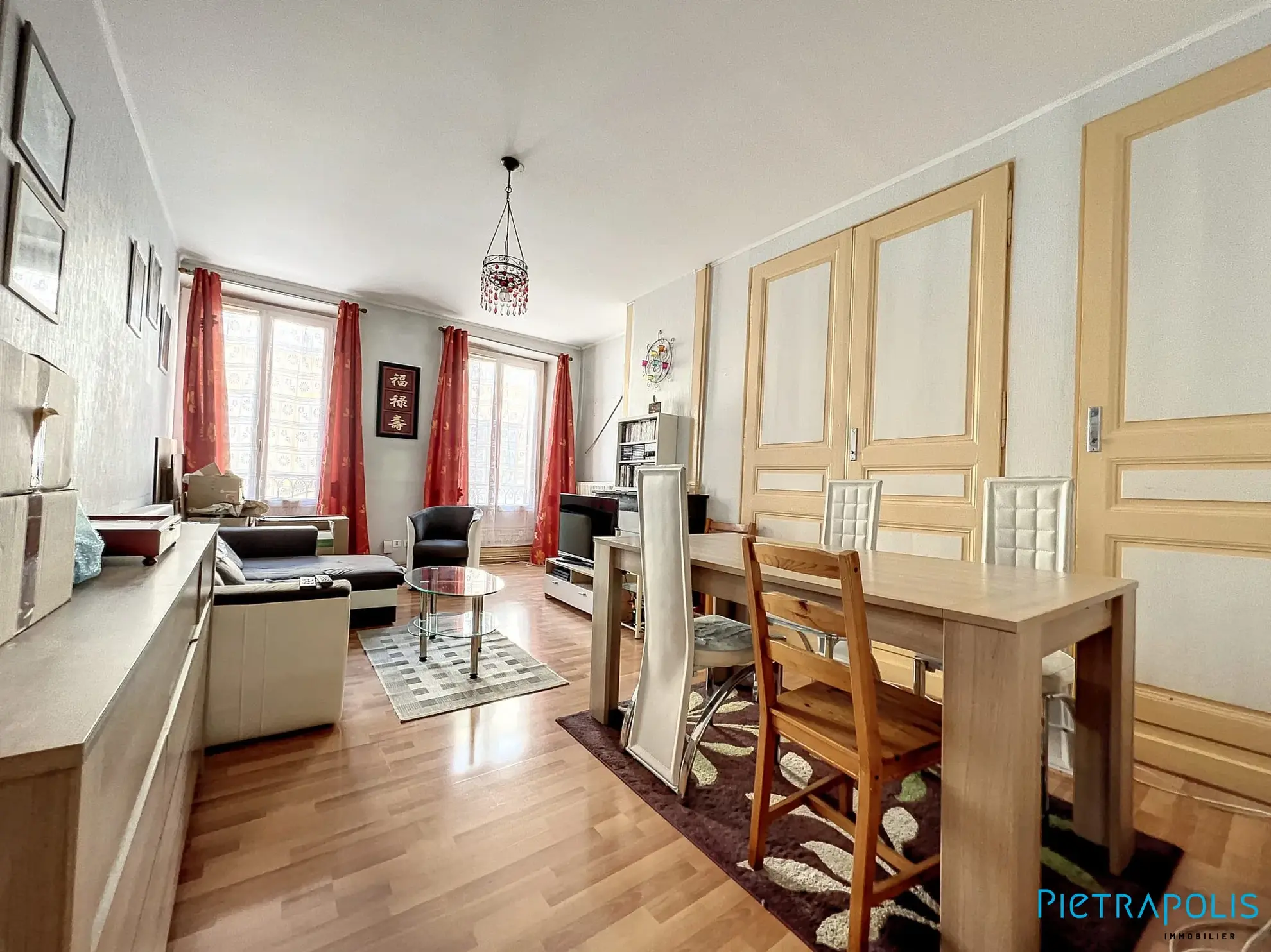 Appartement de 96 m² en plein centre de Tarare avec caves et faibles charges 