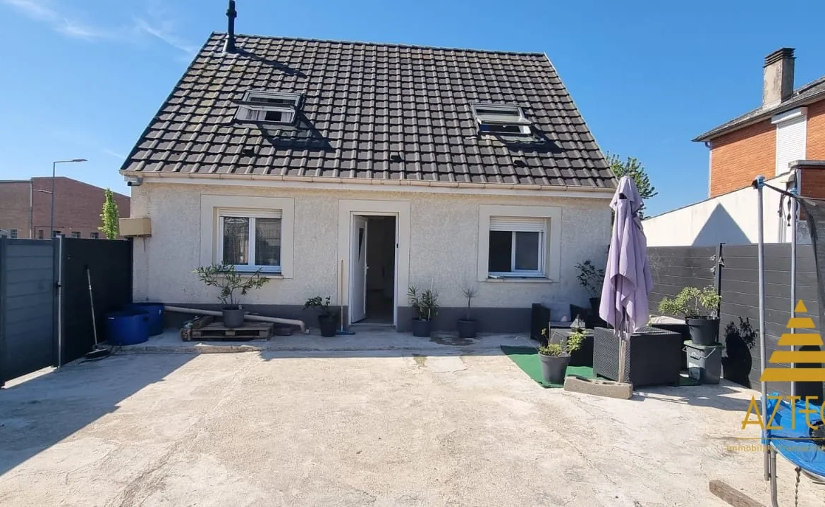 Maison à vendre à Cambrai avec jardin plein sud et terrasse de 30 m² 