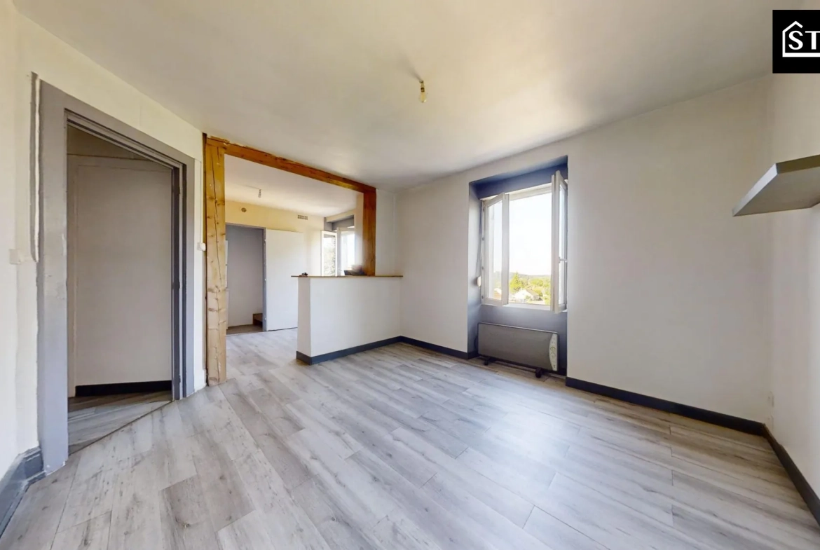 Appartement T3 lumineux à Mélisey avec grenier et cave 