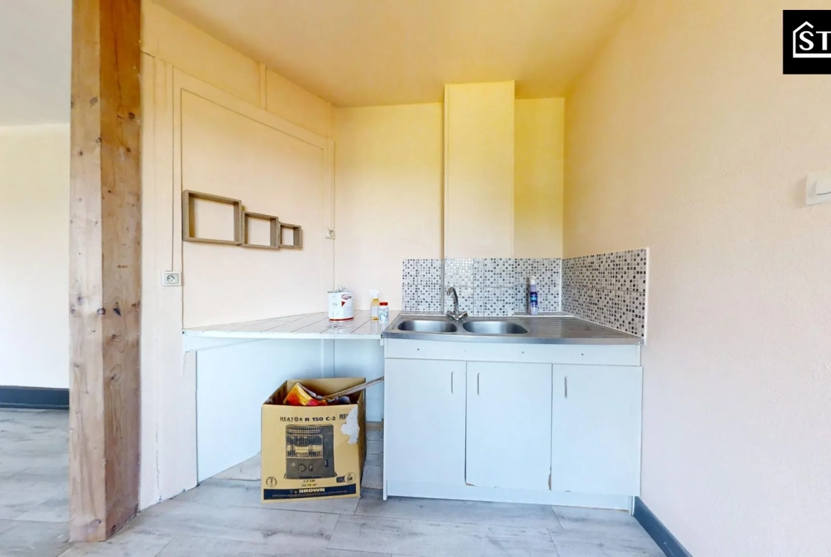 Appartement T3 lumineux à Mélisey avec grenier et cave 