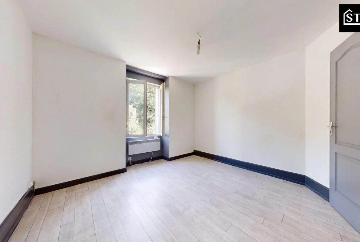 Appartement T3 lumineux à Mélisey avec grenier et cave 