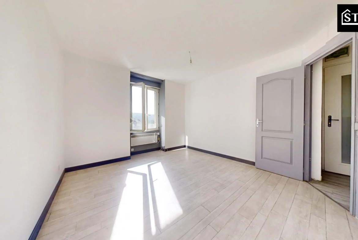 Appartement T3 lumineux à Mélisey avec grenier et cave 