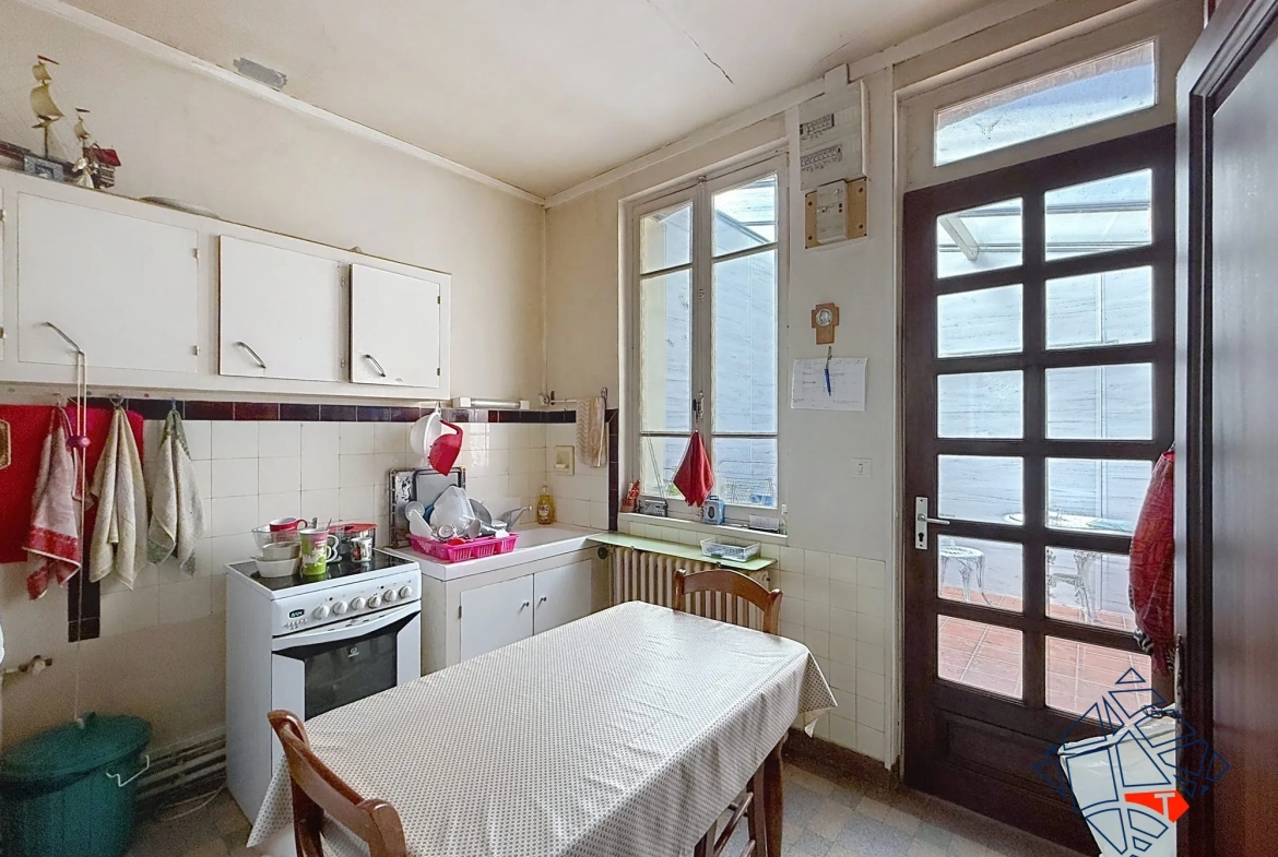 Maison à Sotteville-lès-Rouen avec jardin et grand potentiel 