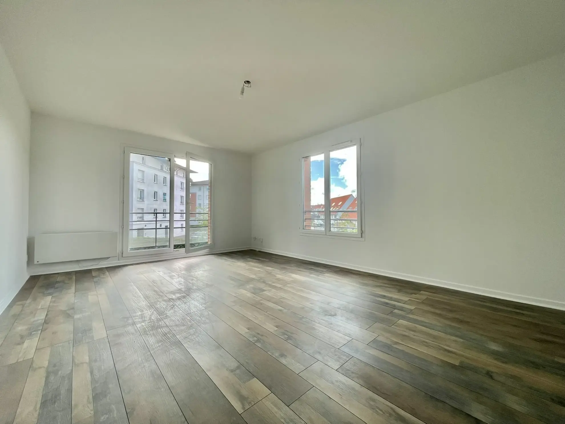 Appartement T3 à vendre à Halluin avec balcon, garage et cave 