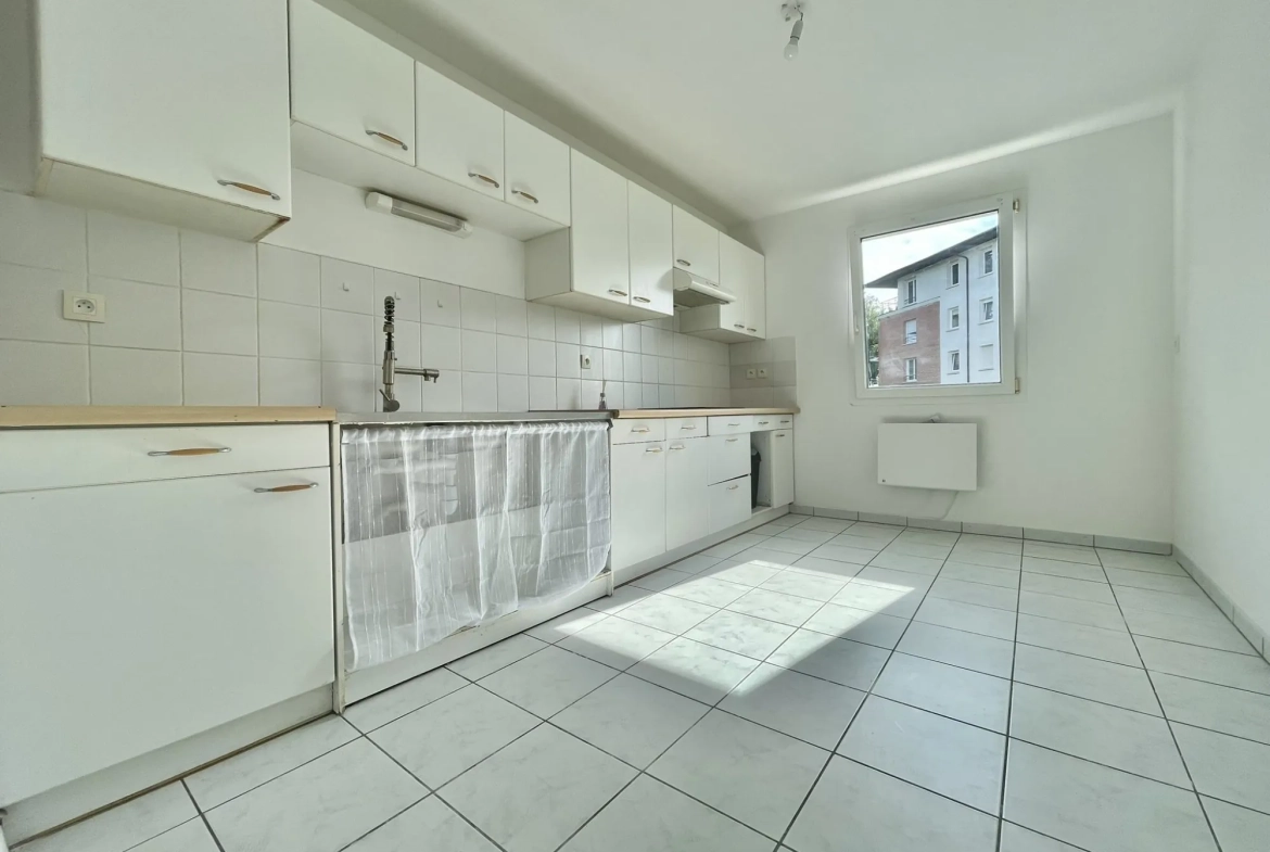 Appartement T3 à vendre à Halluin avec balcon, garage et cave 