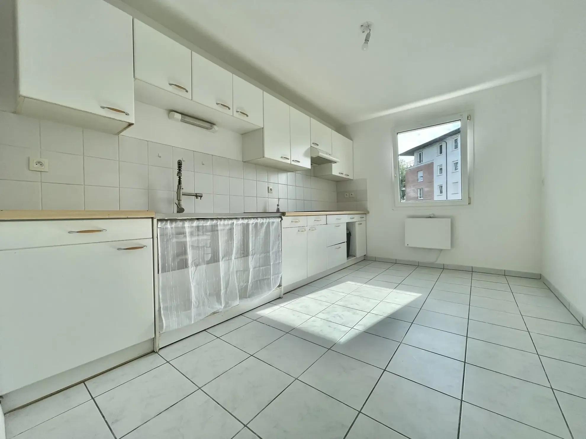 Appartement T3 à vendre à Halluin avec balcon, garage et cave 