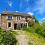 Charmante maison en pierre de 130 m² à Taupont avec dépendances et grand terrain