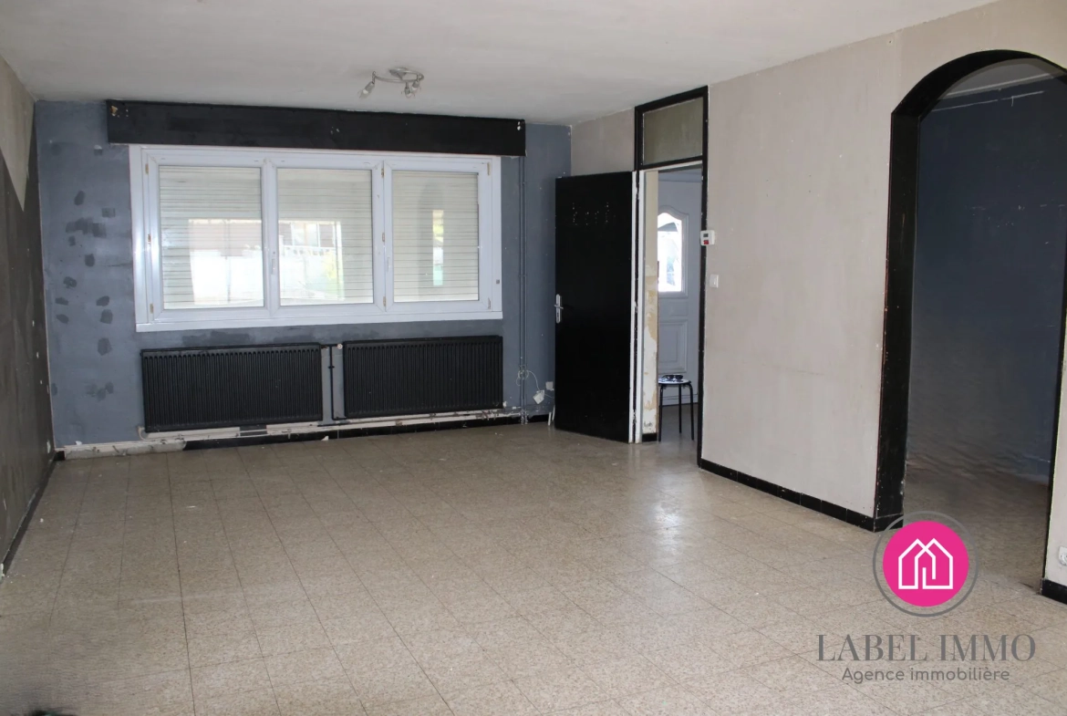Maison à rénover de 92 m² avec 3 chambres et sous-sol complet à Bruay-sur-l'Escaut 