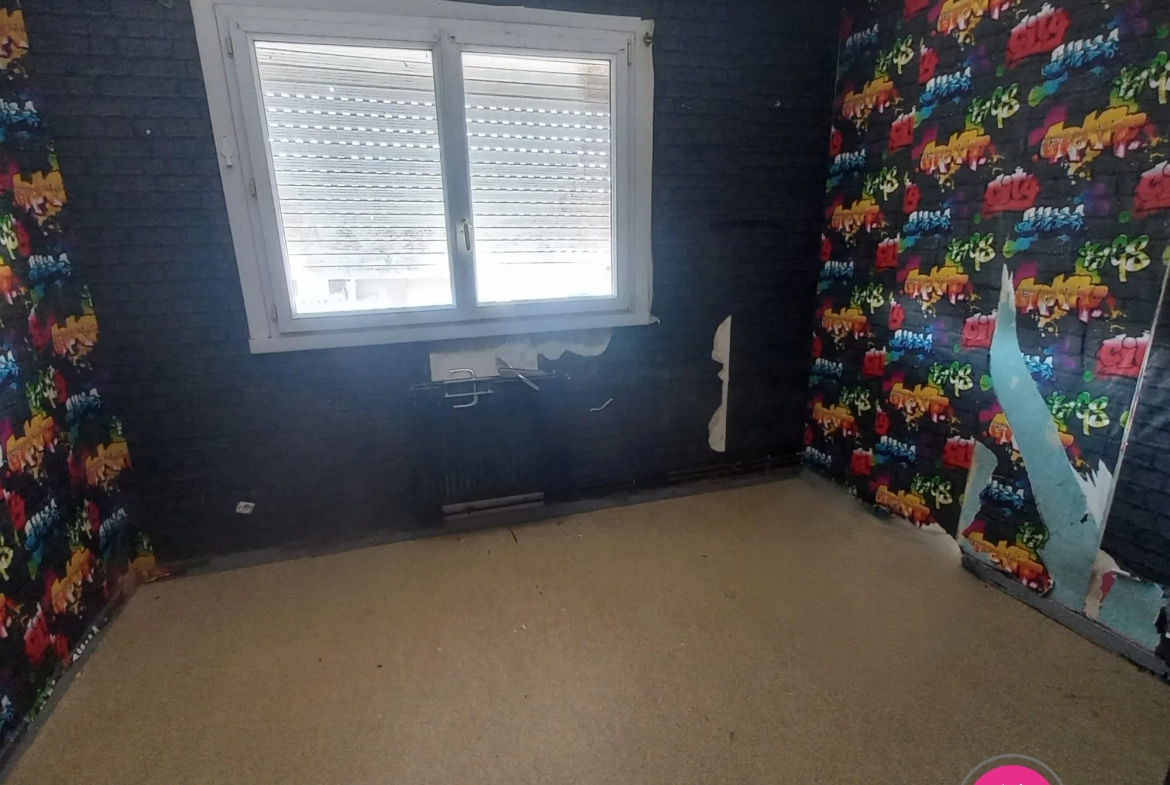 Maison à rénover de 92 m² avec 3 chambres et sous-sol complet à Bruay-sur-l'Escaut 