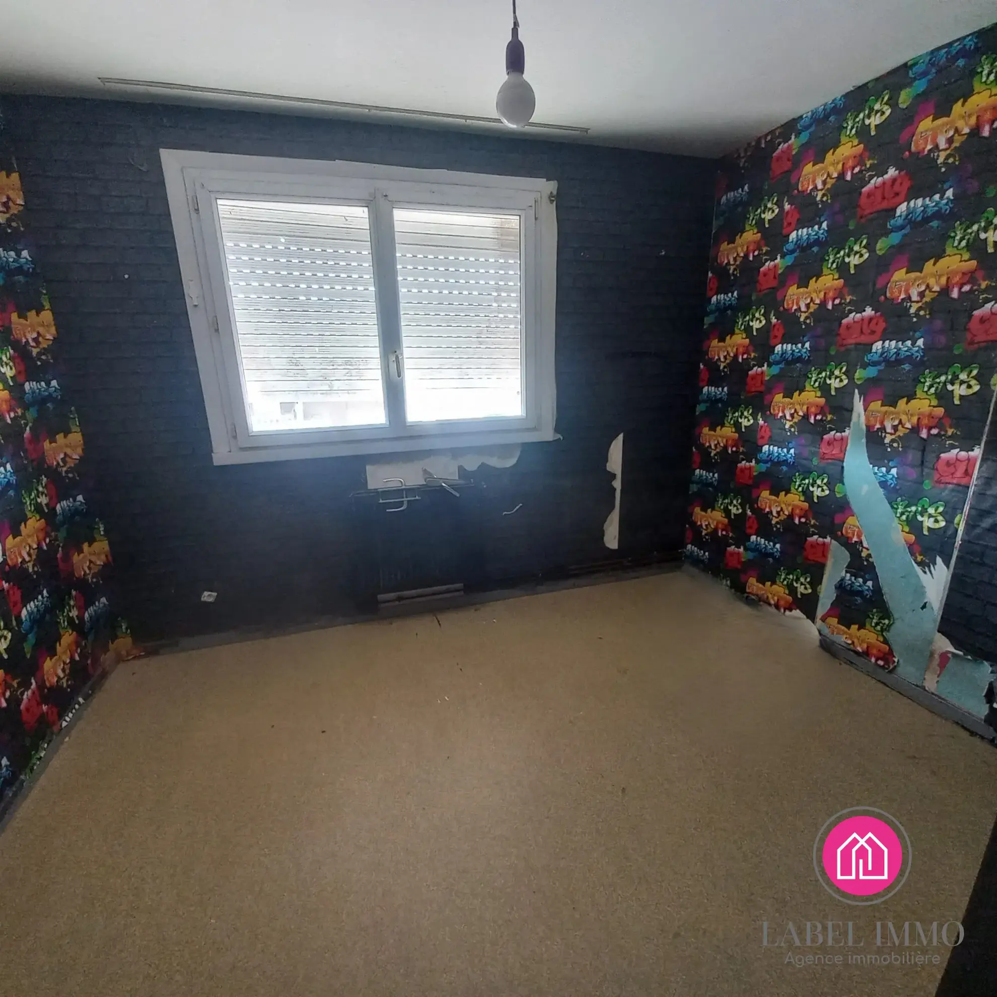 Maison à rénover de 92 m² avec 3 chambres et sous-sol complet à Bruay-sur-l'Escaut 