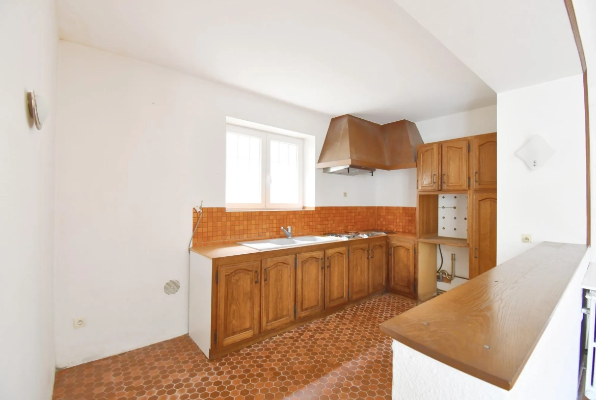 Maison de ville avec terrasse et garage en plein centre d'Autun - 120 m² 